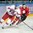 UFA, RUSSIA – DECEMBER 31: Czech Republic's David Musil #6 stick handles the puck as Switzerland's Dario Simon #25 stick checks during preliminary round action at the 2013 IIHF Ice Hockey U20 World Championship. (Photo by Richard Wolowicz/HHOF-IIHF Images)
